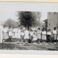 MAF0327_photograph-of-girl-students-lined-up-on-the.jpg
